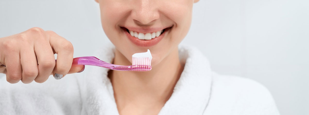 How to brush your teeth without destroying your gums